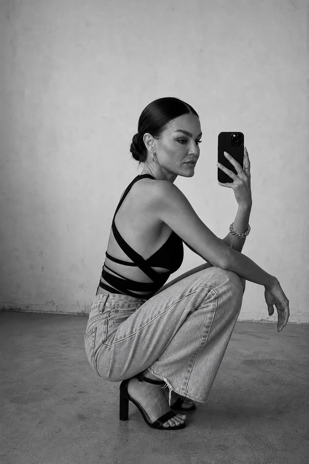 Black-and-white crouched editorial result