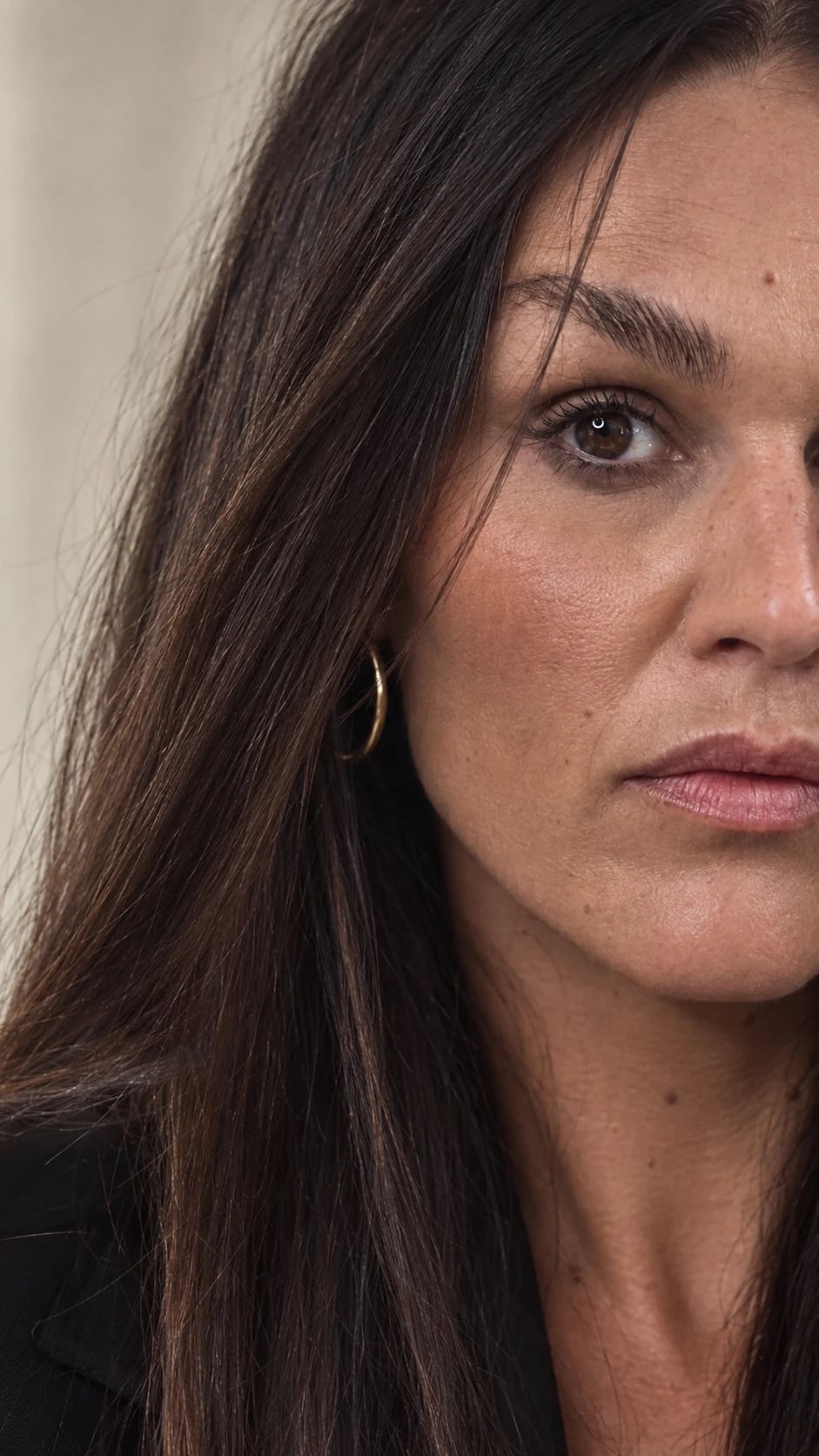 A close crop of Sandra's face and loose hair