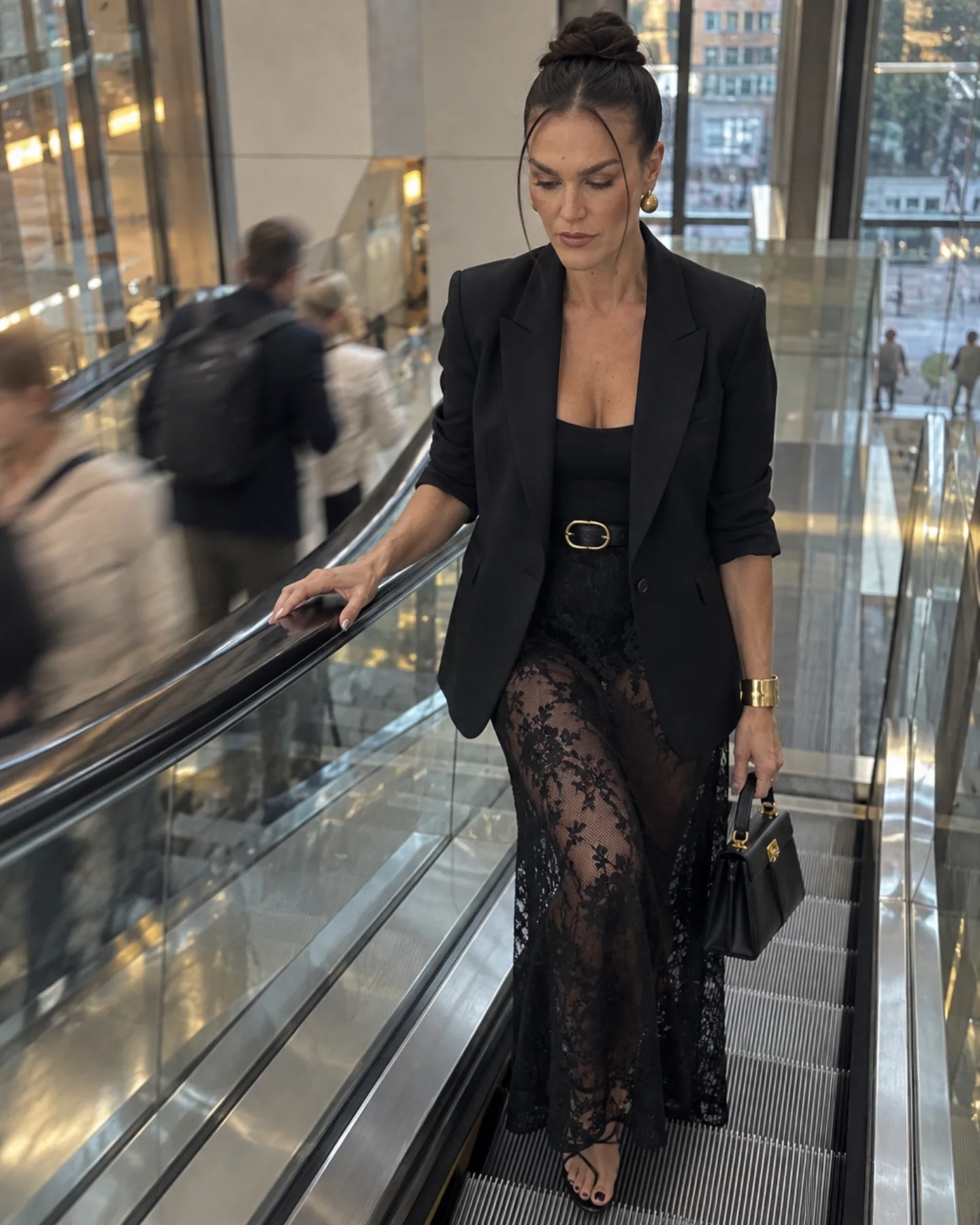A finished SSELFIE photo of Sandra on an escalator