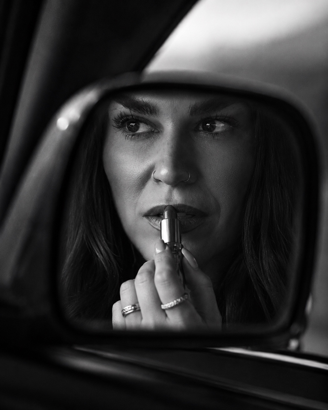 Sandra in the car mirror — editorial selfie